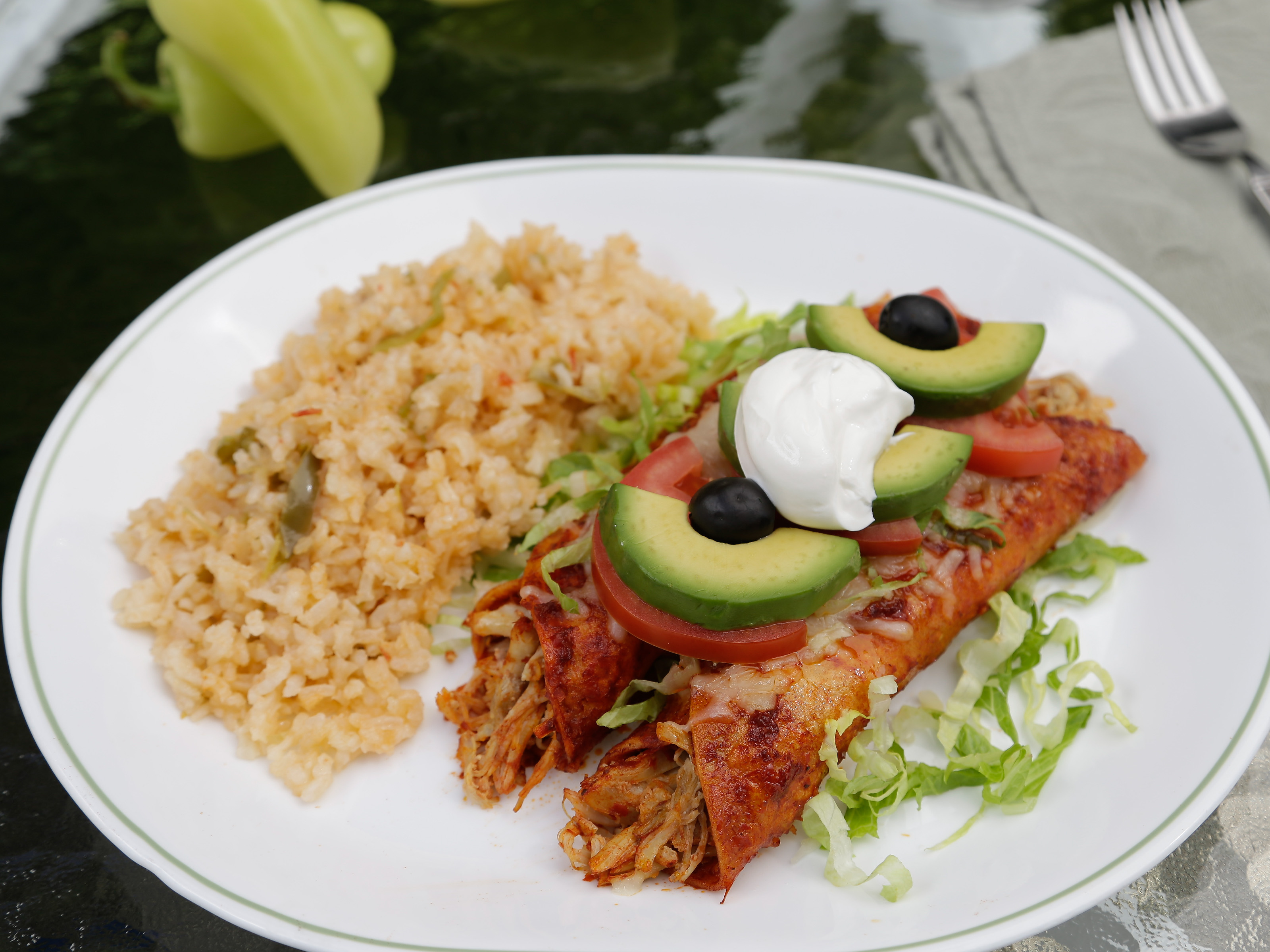 https://www.cookingchanneltv.com/content/dam/images/cook/fullset/2014/8/25/0/CCGMR303_Enchiladas-and-rice-recipe_s4x3.jpg